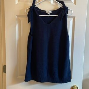 Knit tank top sweater with shoulder tie detail.